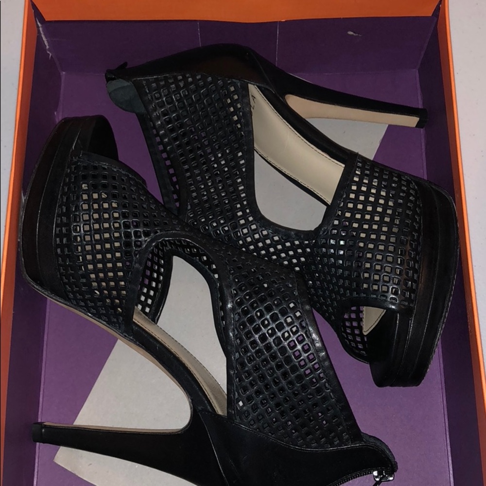 Black sandals made by Isola